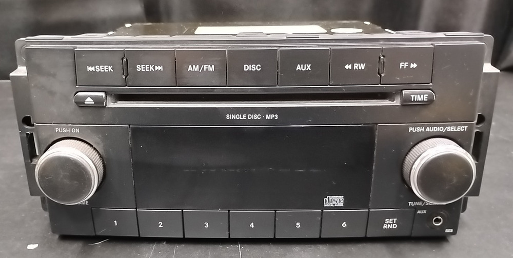 2009-2011 Dodge Jeep Radio AM FM CD P05091224AD RES Single Disc OEM